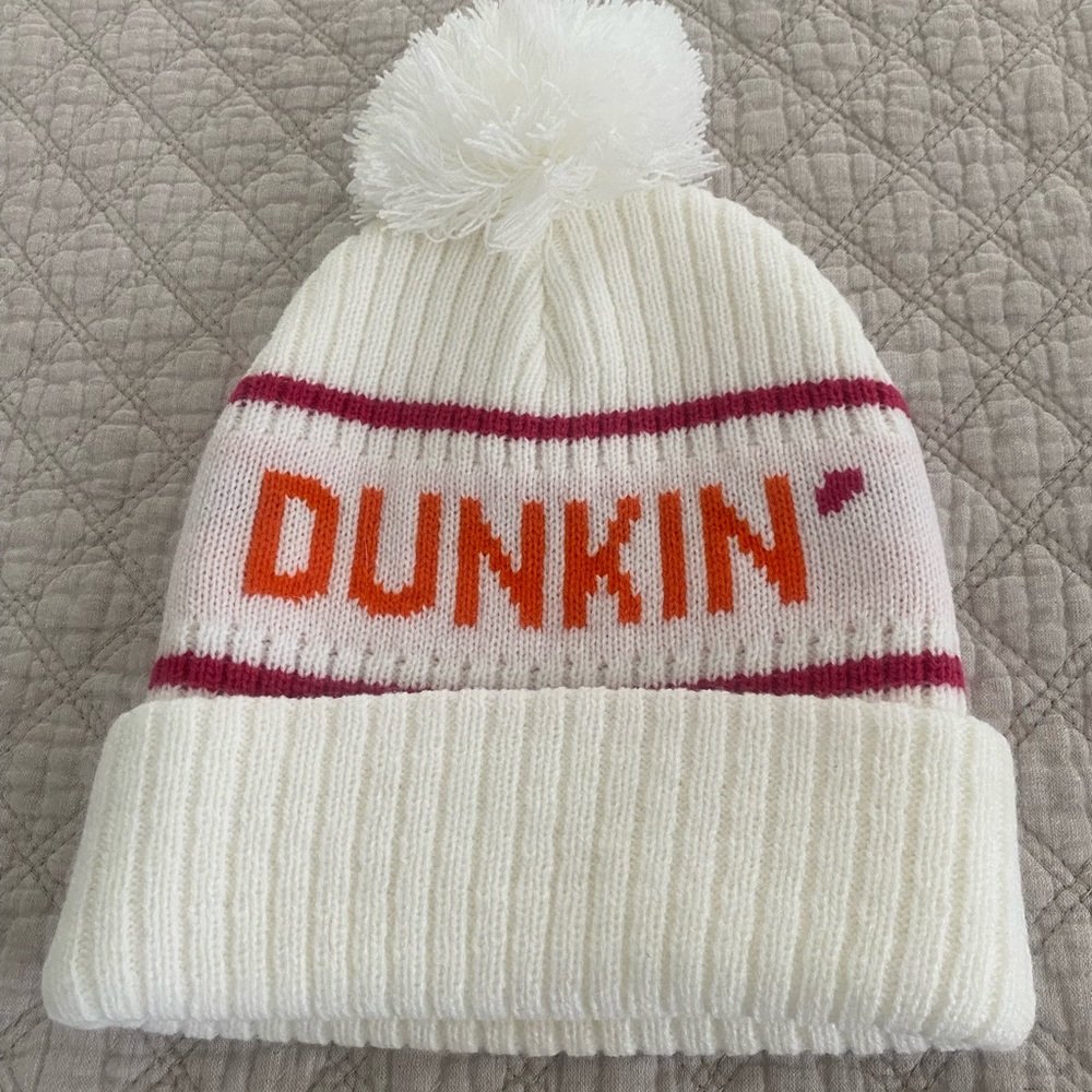 Dunkin Pom-Pom Beanie off white with Dunkin branding.